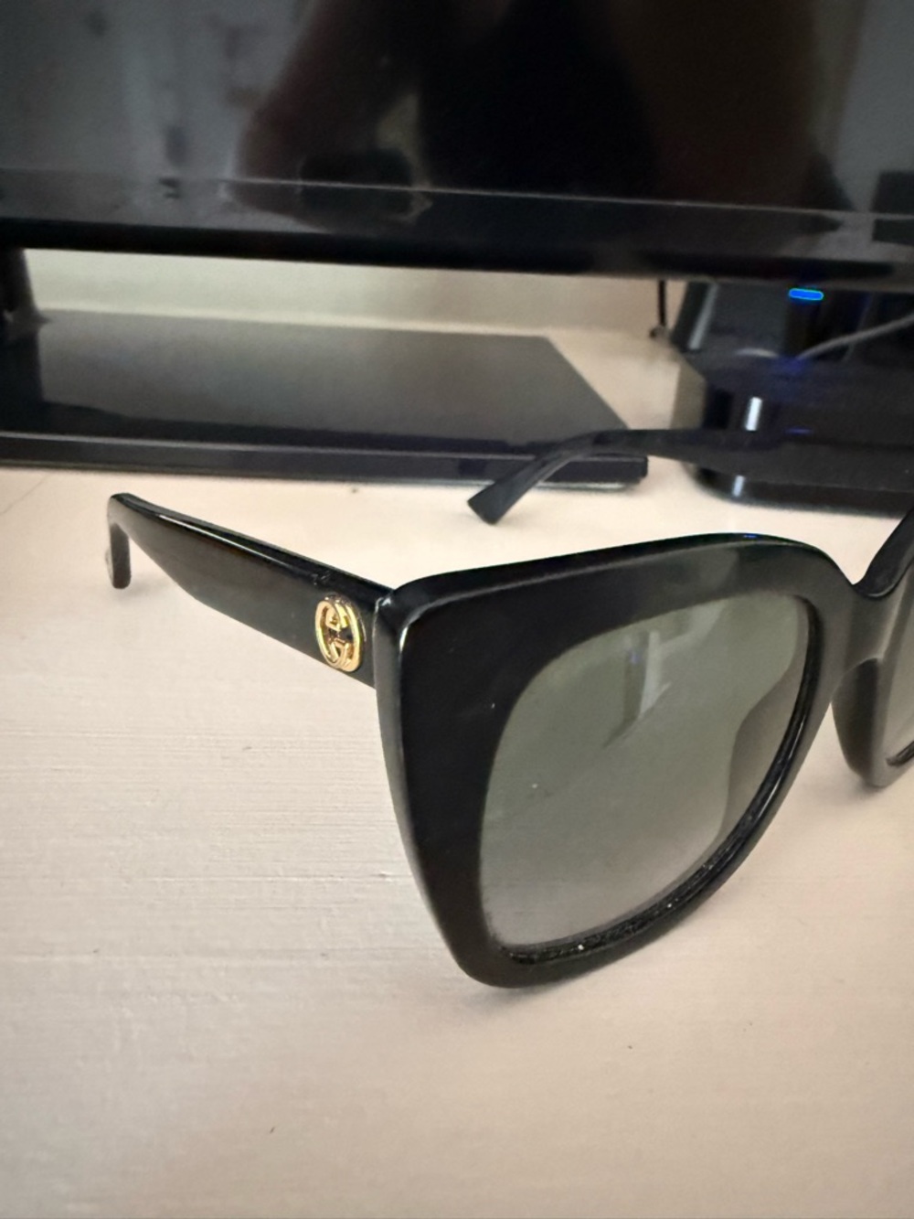 Gucci Black Cat-Eye Sunglasses with Gold Accents - Picture 3 of 11